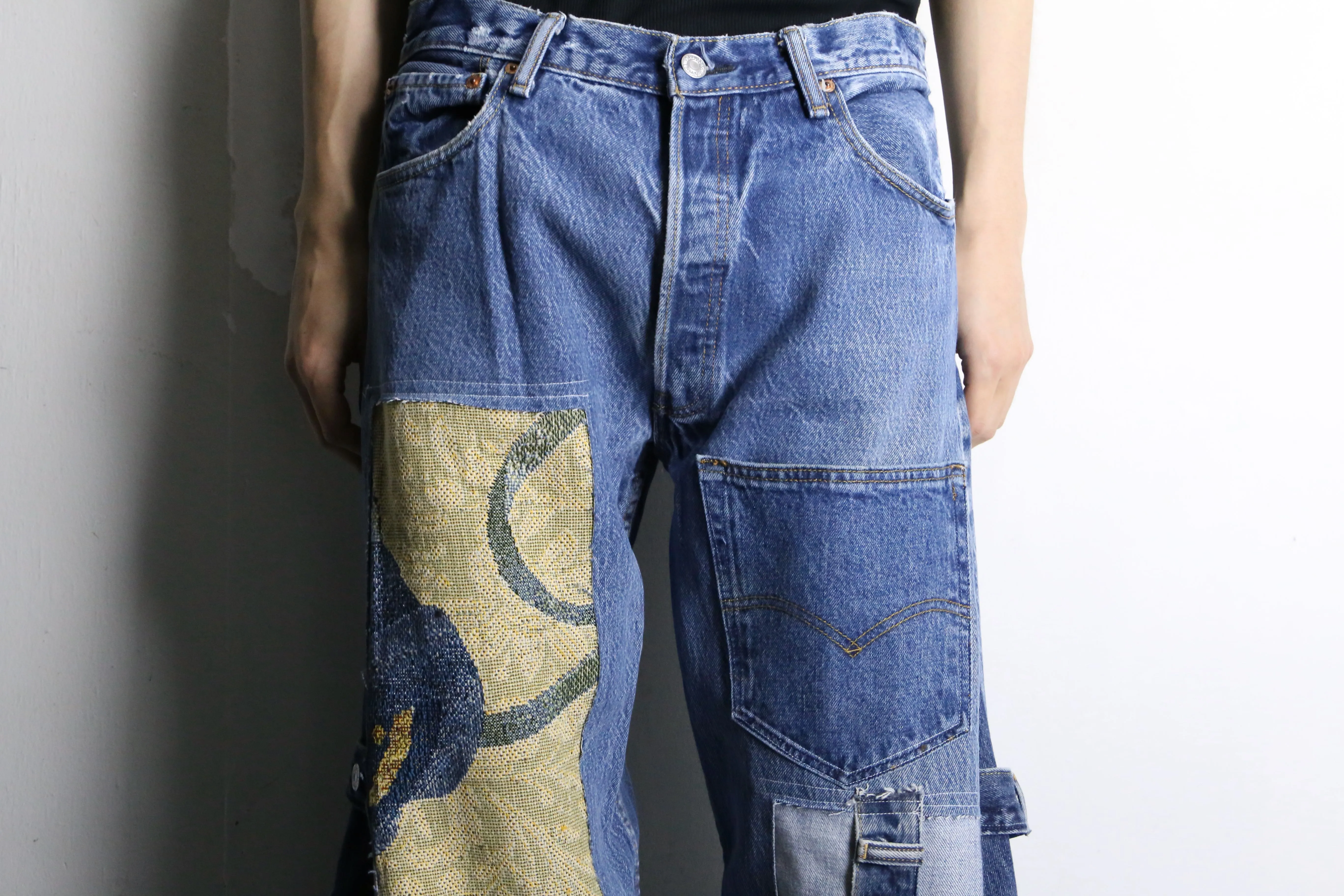 “Re:make” patchwork design flare denim pants