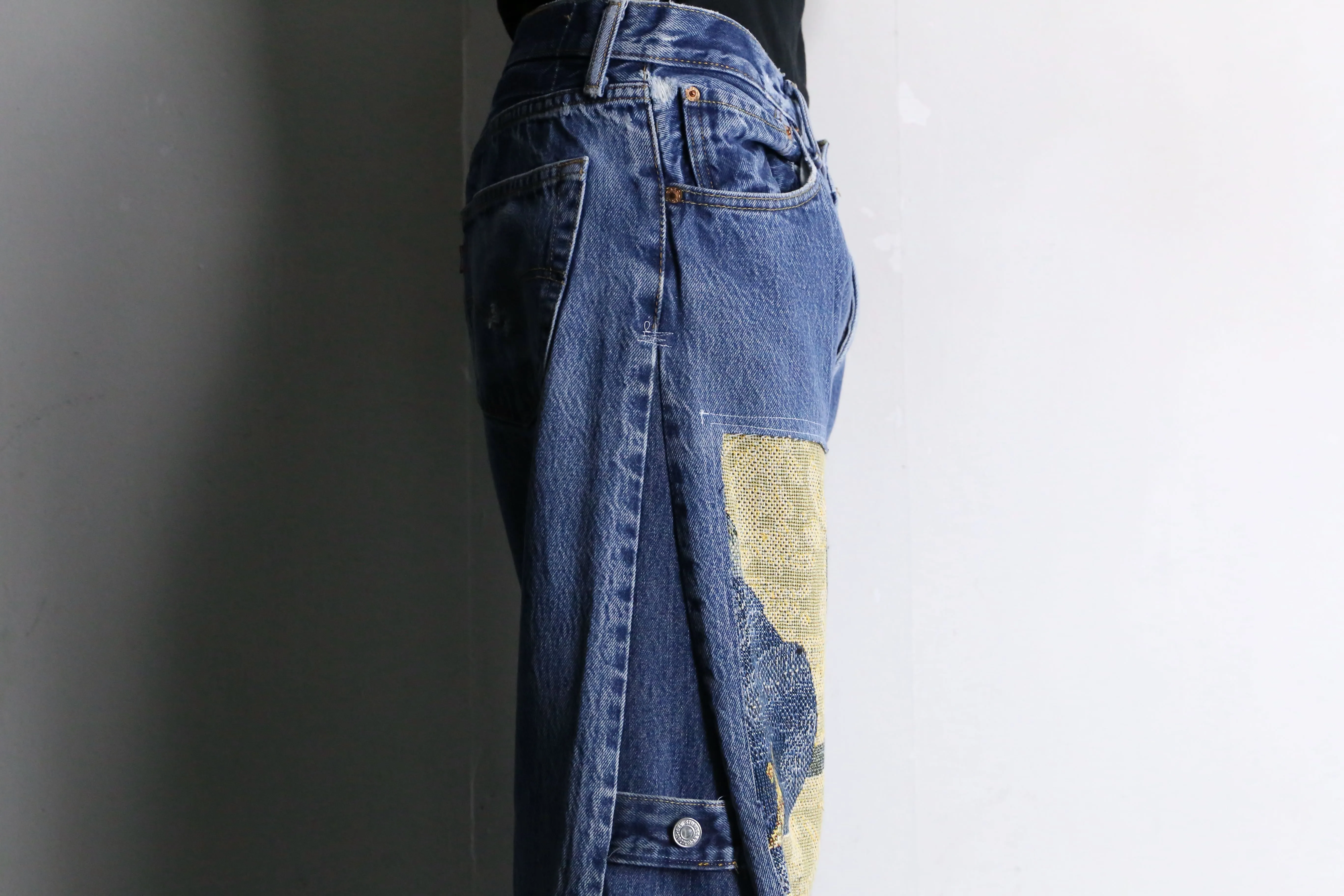 “Re:make” patchwork design flare denim pants