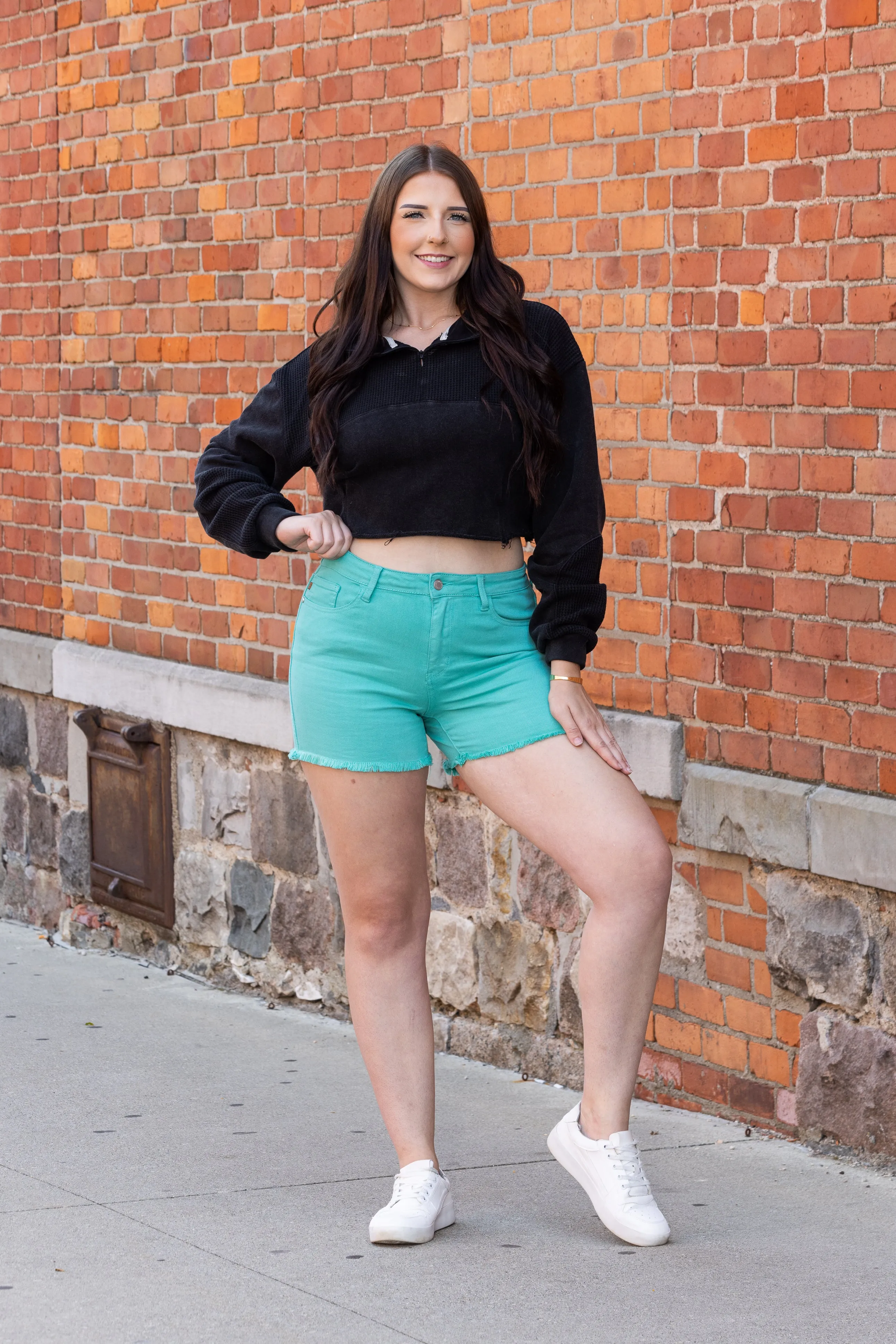 The Lizzie from Judy Blue: Mid-Rise Garment Dyed Fray Hem Denim Shorts